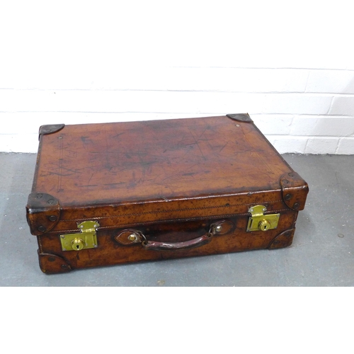 406 - Vintage brown leather suitcase with brass clasps, 62 x 19 x 42cm