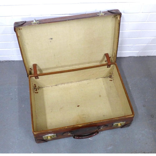 406 - Vintage brown leather suitcase with brass clasps, 62 x 19 x 42cm