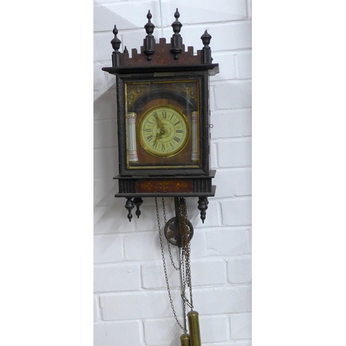 427 - Gothic style wall clock in a stained pine case, with weights and pendulum