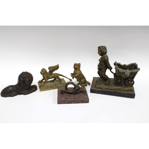 436 - Bronze cherub with carriage, a griffin, desk paperweight and a cast iron lion, etc (5)