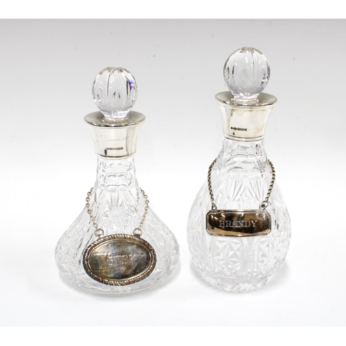 54 - Two small cut glass decanters and stoppers with silver collars, Francis Howard Ltd, Sheffield 2013, ... 