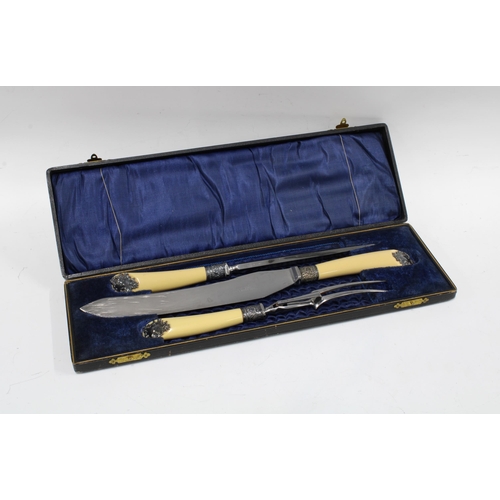 65B - Three piece carving set with composite handles and white metal mounts, in fitted case