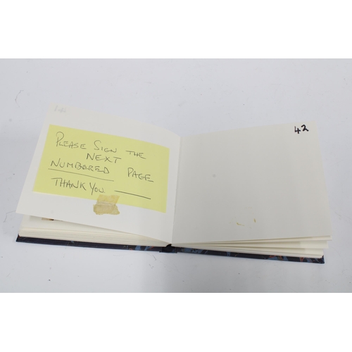 70 - An Autograph album of Scotland Football Club players accompanied by colour photographs to include Ji... 