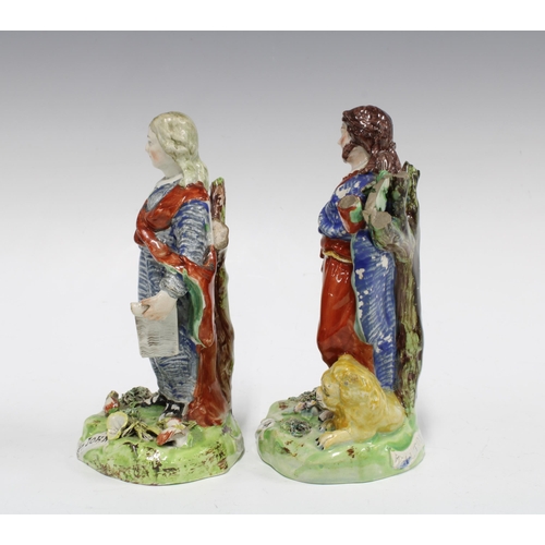 73 - Two early 19th century Walton pearlware pottery figures of St John and St Mark, both with losses, 18... 