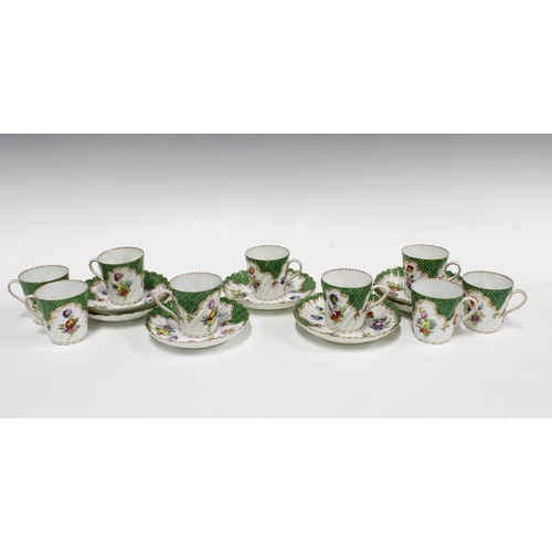 76 - Dresden porcelain coffee can cups and saucers, green scale borders with floral sprays, (16)