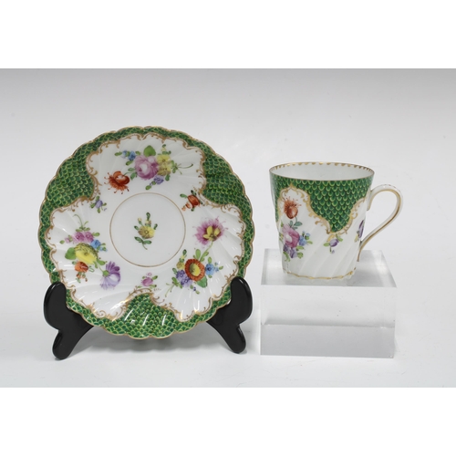 76 - Dresden porcelain coffee can cups and saucers, green scale borders with floral sprays, (16)