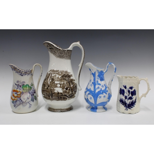 77 - A collection of four 19th century Staffordshire and Scottish pottery jugs, tallest 32cm (4)