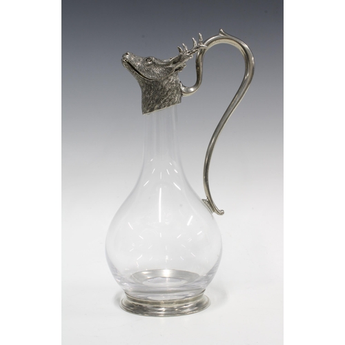 79 - Pewter and glass Stags head claret decanter, 30cm