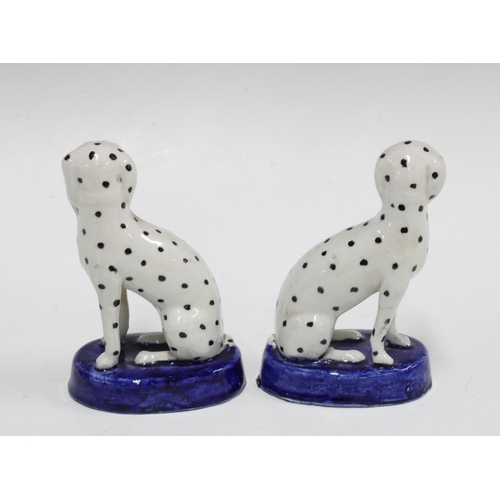 80 - Small pair of 19th century Staffordshire Dalmatians on oval blue bases, 12cm (2)