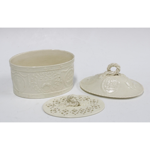 82 - Leeds Pottery creamware oval box and cover with original drainer, relief decorated with Leeds City c... 