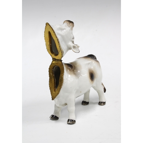 87 - Gilt metal mounted porcelain table snuff in the form a bull, with blue crossed swords mark but likel... 