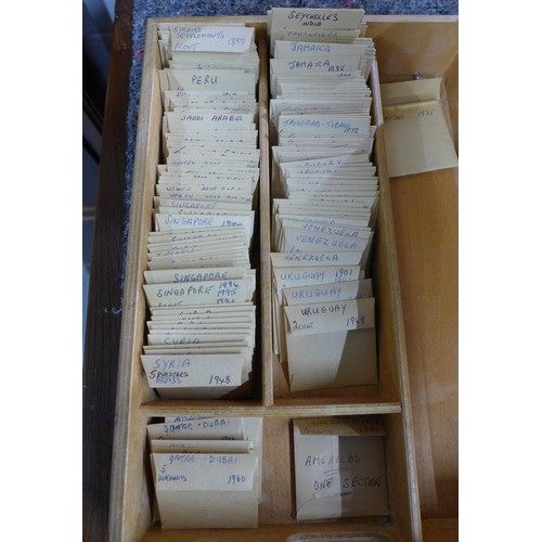 65F - Coin collection contained over 12 trays to include pre decimal and world coins