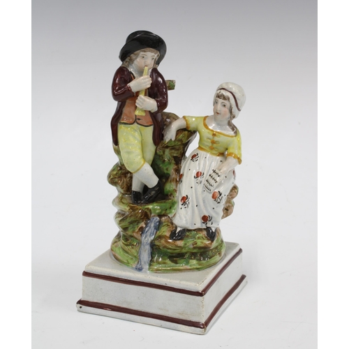 102 - Staffordshire Rural Pastimes pearlware  figure group, 9 x 18cm.