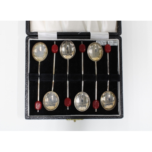 17 - Cased set of six silver coffee bean handled spoons, Birmingham 1934 (6)