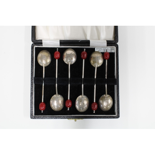 17 - Cased set of six silver coffee bean handled spoons, Birmingham 1934 (6)