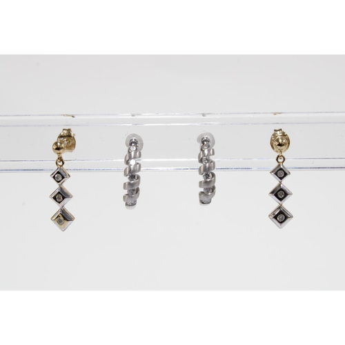 35 - A pair of white gold half hoop earrings, stamped 750 and a pair of 9ct gold drop earrings (2)
