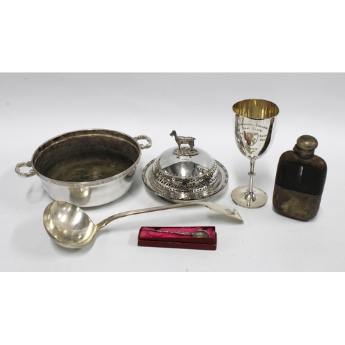 381 - A box containing Victorian and later Epns wares to include a ladle, goblet, hip flask, etc