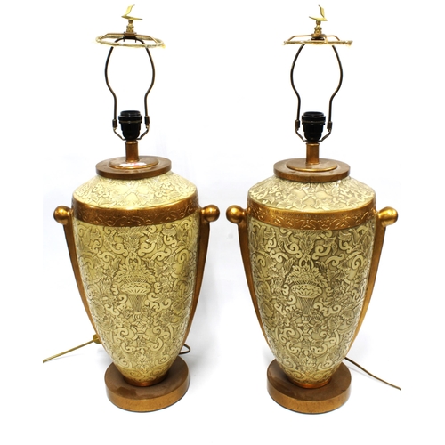 389 - Pair of large ceramic table lamps with foliate pattern in relief, 36 x 80cm. (2)