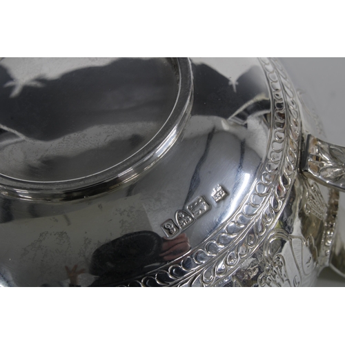 60 - An Edwardian silver bowl with single handle, George Nathan & Ridley Hayes, Chester 1905, engraved wi... 
