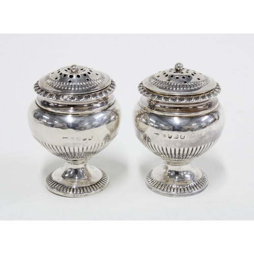 66 - A pair of George III  silver bun casters, London 1798, 8cm (2)