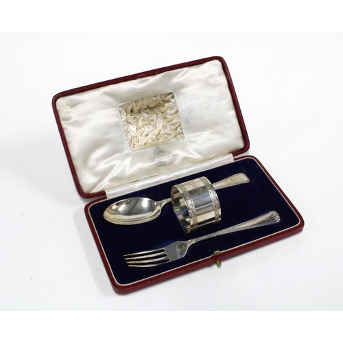 99I - Hamilton & inches silver christening set with fork, spoon and napkin ring engraved 'Anne', Edinburgh... 