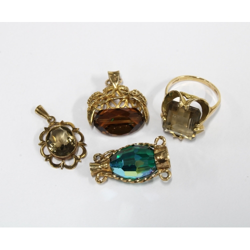 78 - 9ct gold smoky quartz dress ring, 9ct gold pendant and two 9ct gold mounted charms (4)