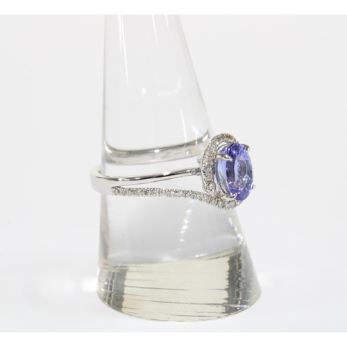 88 - 14ct white gold tanzanite and diamond ring