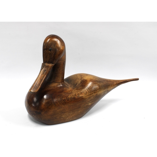 395 - Wood model of a duck with beaded eyes, 41cm long