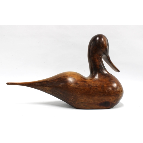 395 - Wood model of a duck with beaded eyes, 41cm long