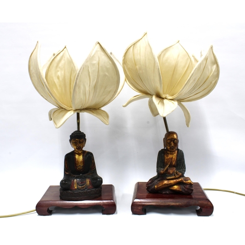 402 - A pair of chinoiserie wooden base table lamps with detachable giltwood painted figures, lotus flower... 