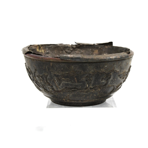 409 - 19th century carved coconut bowl with a white metal liner, (a/f) 13cm diameter