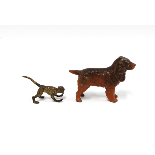 411 - Cold painted bronze monkey 5cm long, and a cold painted spelter spaniel, 8cm long (2)