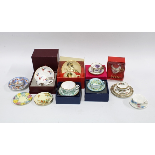 417 - A collection of miniature bone china and porcelain cups and saucers (a lot)