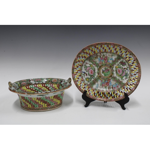 107 - Chinese famille rose pierced basket and stand and a plate with blue and gilt border (2) 30cm.