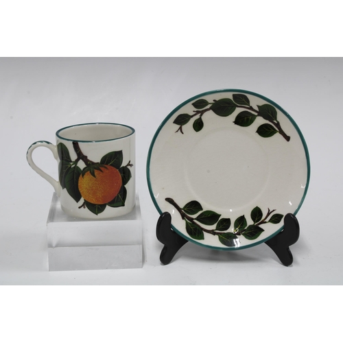 111 - Griselda Hill Pottery cup and saucer painted with oranges pattern (2) 13cm.