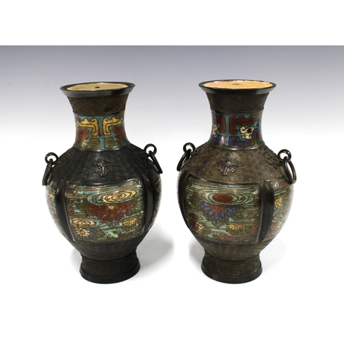 146 - A pair of large Chinese bronze and champleve vases, archaic form with ring loops to the shoulders, e... 