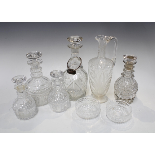 153 - 19th century and later glass decanters, one with a whisky decanter label,  together with a wheatshea... 