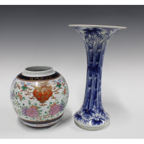 159 - A Japanese blue and white bamboo pattern vase together with a ginger jar, taller 31cm (2) 17 x 31cm.