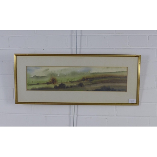 182 - MEHDI MOAZZEN, Pembrokeshire watercolour, signed and framed under glass, 53 x 14cm