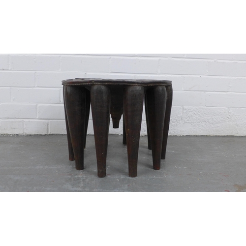 207 - Nupe West African table, circular carved top with a removable section to centre, 39 x 30cm