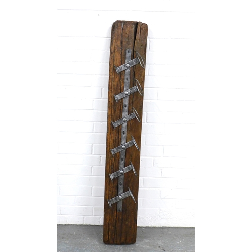 214 - A railway sleeper type wooden wine rack with six metal bottle holders , 138 x 21cm together with a w... 