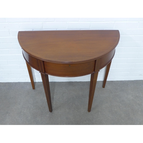 221 - Mahogany D-end fold over cutlery table table opening to reveal a suite of  EPNS flatware, with four ... 