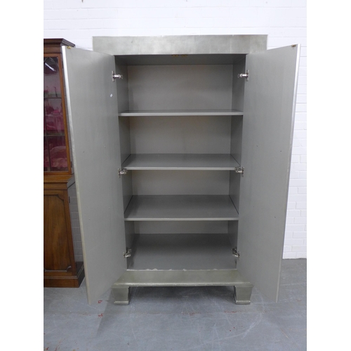 226 - Contemporary silvered armoire opening to reveal a shelved interior, likely by Andrew Martin, 110 x 1... 