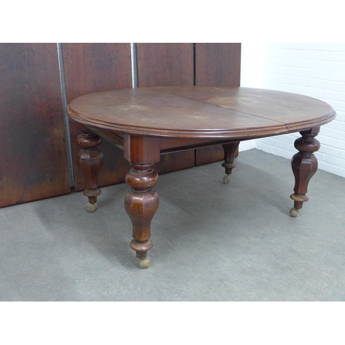 240 - Victorian mahogany extending dining table, with four extra leaves, standing on four facet bulbous le... 