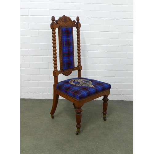 310 - Hume family crest and tartan upholstered chair, 48 x 100 x 39cm.