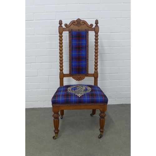 310 - Hume family crest and tartan upholstered chair, 48 x 100 x 39cm.