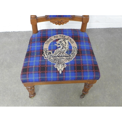 310 - Hume family crest and tartan upholstered chair, 48 x 100 x 39cm.