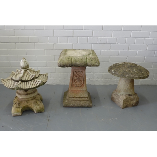 319 - Garden ornaments to include a toadstool, pagoda and table,  37 x 52cm. (3)