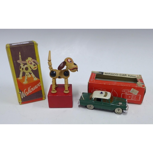 342 - Schuco Miraco-Car Polizei with original box and a Wakowwa wooden dog puppet, boxed (2)