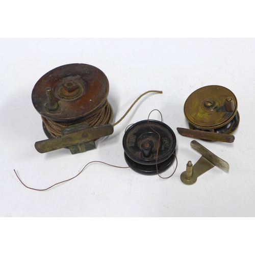 345 - Vintage ELO Bakelite fishing reel, a wooden reel and a brass reel, (3)